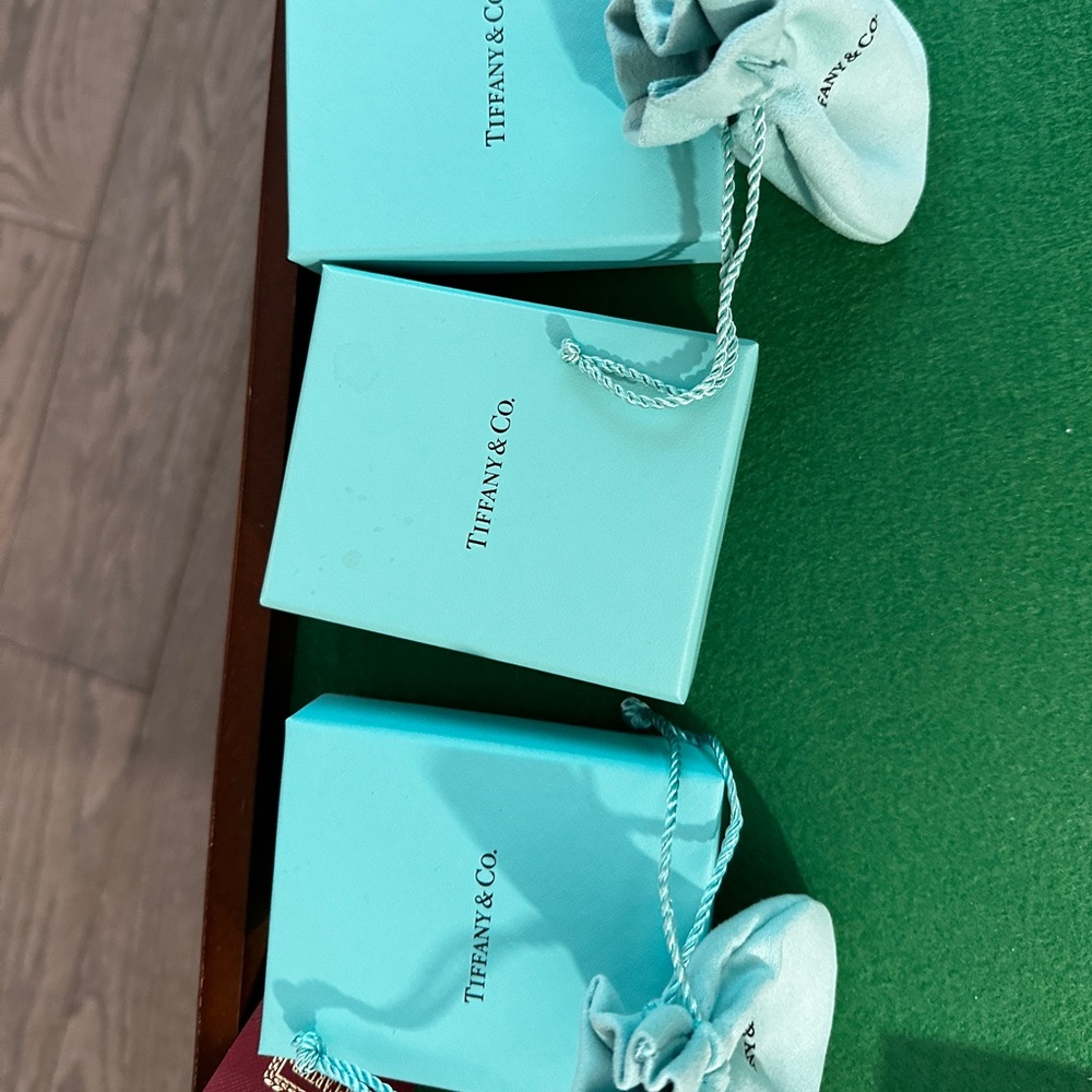 Brand new Tiffany boxes with jewelry pouch
￼